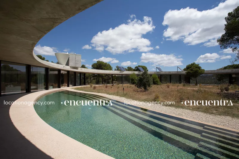 Circled 008-hi002-highlights-house-without-limits-nature-view-circular-house-concrete-architecture-lake-pool.JPG