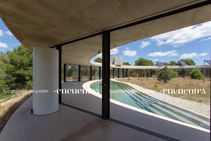 Circled 007-hi002-house-without-limits-nature-view-circular-house-concrete-architecture-lake-pool.JPG